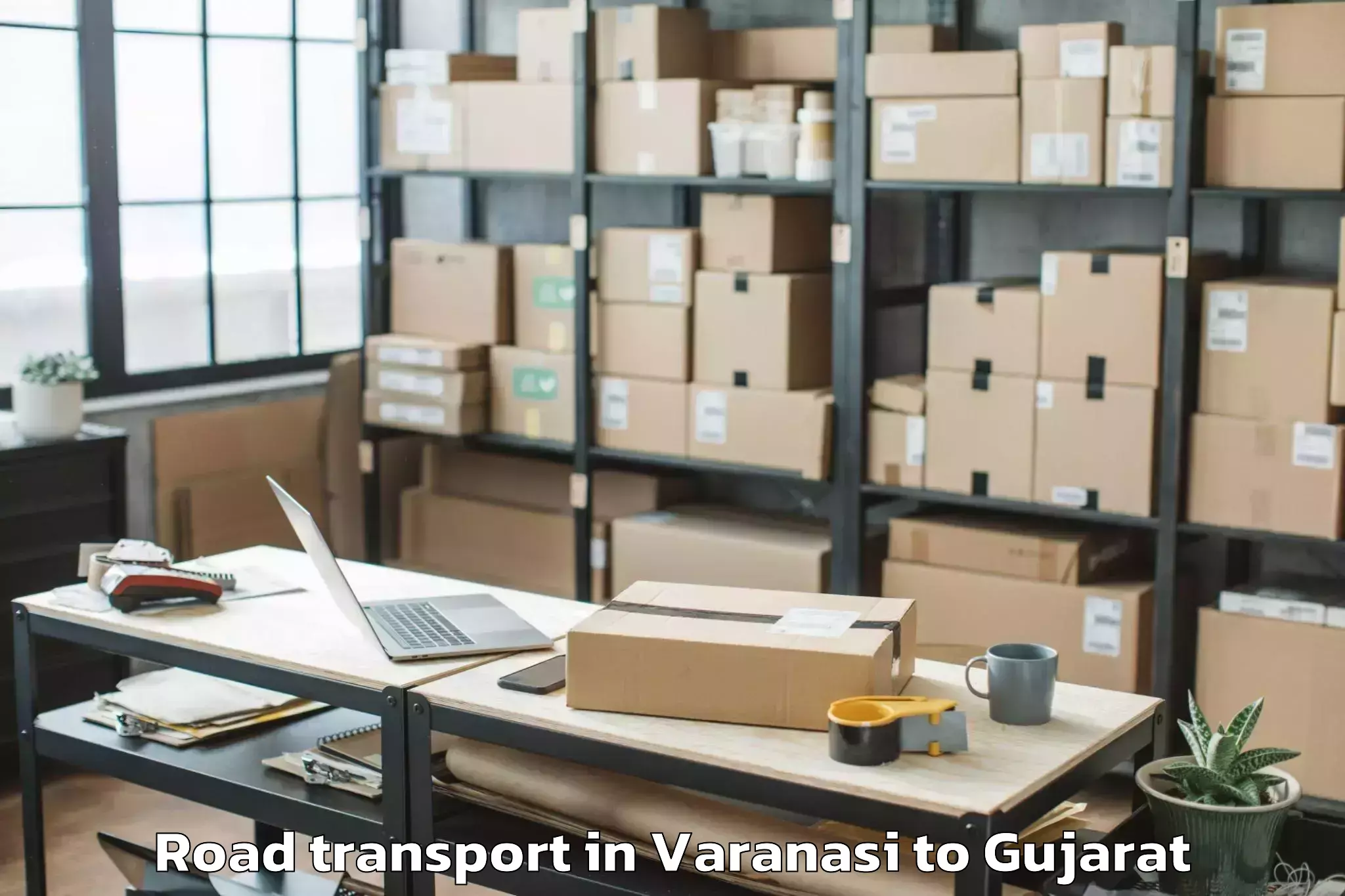 Varanasi to P P Savani University Kosamba Road Transport Booking